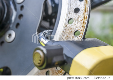 Disc locks used for motorcycle theft prevention. 139438396