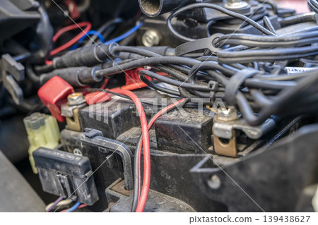 Battery replacement as part of motorcycle maintenance 139438627