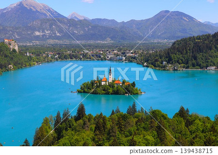 Bled Island floating in Lake Bled, viewed from a hilltop. Bled Island floating in Lake Bled, viewed from a hilltop. 139438715