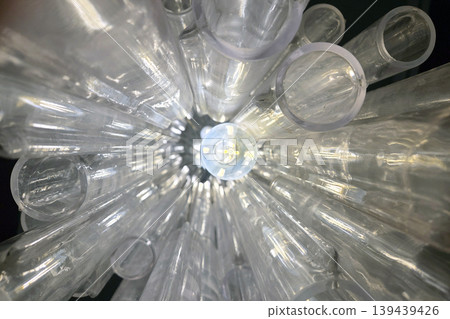 Abstract Tubular Glass Art Installation with Illuminated Center for Modern Design Inspiration Abstract Tubular Glass Art Installation with Illuminated Center for Modern Design Inspiration 139439426