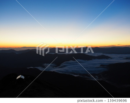 Summer sunrise viewed from the summit of Mount Echigo-Komagatake Summer sunrise viewed from the summit of Mount Echigo-Komagatake 139439696