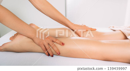 anti cellulite leg and foot massage. massage for slim leg and body anti cellulite leg and foot massage. massage for slim leg and body 139439997