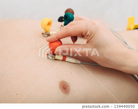 patient getting heart rate monitored at hospital. Close-up Of Ecg electrode 139440050