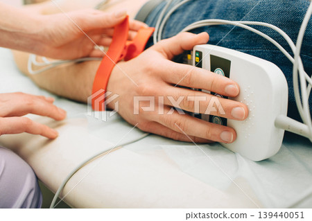 patient getting heart rate monitored at hospital. Close-up Of Medical Equipment patient getting heart rate monitored at hospital. Close-up Of Medical Equipment 139440051