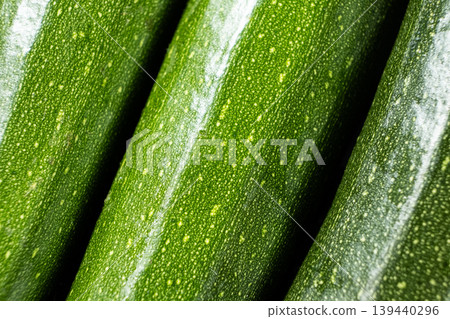 Close-up of Fresh Green Zucchini with Water Drops Top View Close-up of Fresh Green Zucchini with Water Drops Top View 139440296