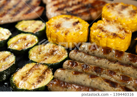 Grilled vegetables and meat, close-up. Grilled vegetables and meat, close-up. 139440316