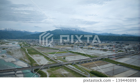 Scenes of the Hokuriku Expressway and Hokuriku Shinkansen viaducts around the Kurobe River in May. Scenes of the Hokuriku Expressway and Hokuriku Shinkansen viaducts around the Kurobe River in May. 139440895