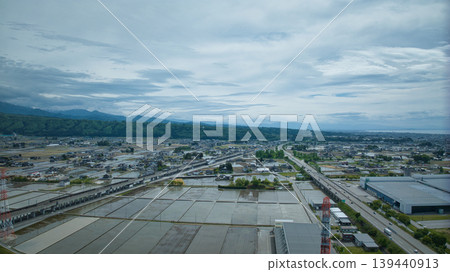 Scenes of the Hokuriku Expressway and Hokuriku Shinkansen viaducts around the Kurobe River in May. Scenes of the Hokuriku Expressway and Hokuriku Shinkansen viaducts around the Kurobe River in May. 139440913