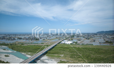 Scenes of the Hokuriku Expressway and Hokuriku Shinkansen viaducts around the Kurobe River in May. Scenes of the Hokuriku Expressway and Hokuriku Shinkansen viaducts around the Kurobe River in May. 139440926