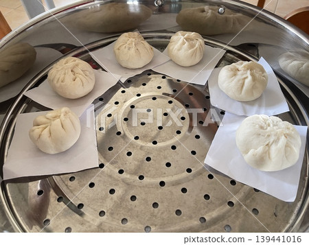Multiple Raw Handmade Baozi Buns Arranged In Large Steamer Tray Multiple Raw Handmade Baozi Buns Arranged In Large Steamer Tray 139441016
