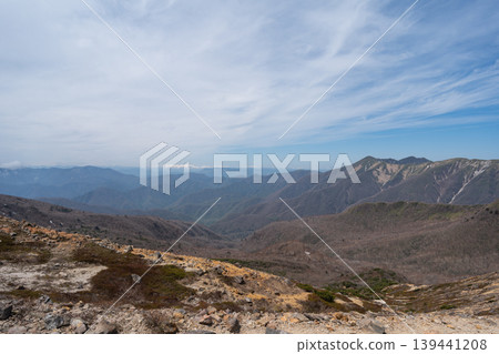 View from the hiking trail between Mt. Chausu and the mountain pass teahouse (Nasu Mountain Range) 139441208