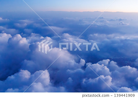 Sunset above the clouds from airplane 139441909
