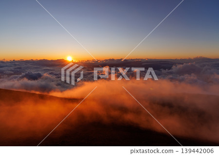 Sunset above clouds from volcano in Hawaii 139442006