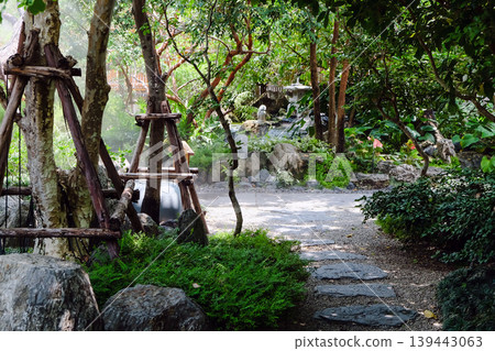 Japanese style garden with green plants 139443063
