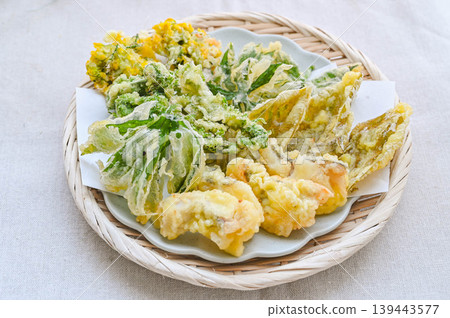 Assortment of seasonal wild vegetable and cod tempura Assortment of seasonal wild vegetable and cod tempura 139443577