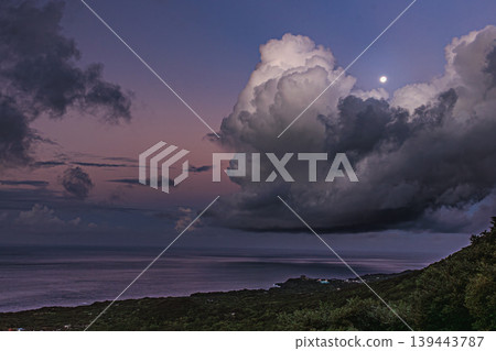 A breathtaking view of Yakushima Island: the pre-dawn sky and vast expanse of giant clouds. A breathtaking view of Yakushima Island: the pre-dawn sky and vast expanse of giant clouds. 139443787