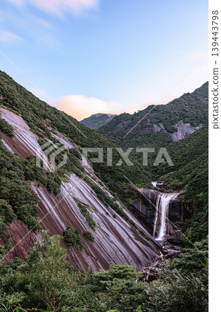 A beautiful morning scene on Yakushima Island, with its deep green foliage and waterfalls. A beautiful morning scene on Yakushima Island, with its deep green foliage and waterfalls. 139443798