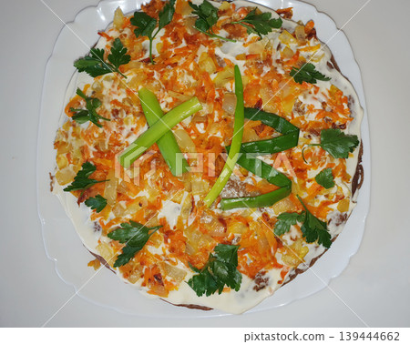 Homemade liver cake decorated with fried carrots, onions and fresh herbs Homemade liver cake decorated with fried carrots, onions and fresh herbs 139444662