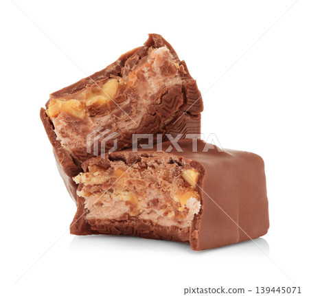 Bitten chocolate bar isolated on transparent background with full focus. Sweet dessert snack concept showing bite mark, ideal for food advertising, packaging, and commercial design Bitten chocolate bar isolated on transparent background with full focus. Sweet dessert snack concept showing bite mark, ideal for food advertising, packaging, and commercial design 139445071