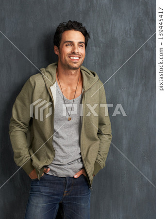 Fashion, thinking and man on gray background happy with trendy style, clothes and casual outfit. Smile, handsome and person looking on studio wall with confidence, pride and positive attitude Fashion, thinking and man on gray background happy with trendy style, clothes and casual outfit. Smile, handsome and person looking on studio wall with confidence, pride and positive attitude 139445417