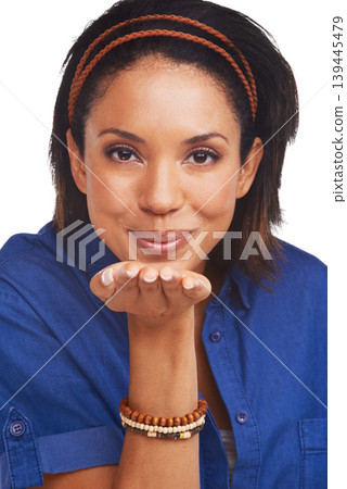Portrait, love and blowing a kiss with a woman in studio isolated on white background for romance or flirting. Face, smile or happy and a confident young person with a hand gesture emoji of affection Portrait, love and blowing a kiss with a woman in studio isolated on white background for romance or flirting. Face, smile or happy and a confident young person with a hand gesture emoji of affection 139445479
