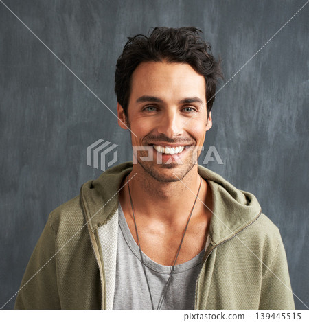 Fashion, happy and portrait of man on gray background with trendy style, clothes and casual outfit. Smile, handsome and face of person on texture wall with confidence, pride and positive attitude Fashion, happy and portrait of man on gray background with trendy style, clothes and casual outfit. Smile, handsome and face of person on texture wall with confidence, pride and positive attitude 139445515