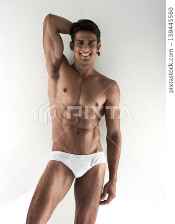 Portrait, smile and man with underwear, beauty and confident guy isolated on white studio background. Person, mockup space or model with bodybuilding, healthy and joy with fitness, muscle and natural Portrait, smile and man with underwear, beauty and confident guy isolated on white studio background. Person, mockup space or model with bodybuilding, healthy and joy with fitness, muscle and natural 139445560