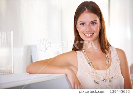 Happy, woman and portrait at reception desk in office with confidence in administration of business. Secretary, smile and receptionist welcome in lobby or pride for working in company and morning Happy, woman and portrait at reception desk in office with confidence in administration of business. Secretary, smile and receptionist welcome in lobby or pride for working in company and morning 139445653