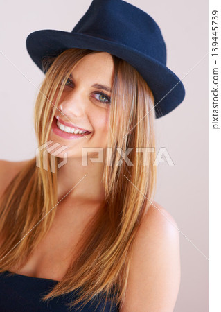 Hipster, hat and portrait of happy woman with vintage, fashion and confidence in white background or studio. Retro, style and face of person in old fashioned fedora with makeup, cosmetics and beauty Hipster, hat and portrait of happy woman with vintage, fashion and confidence in white background or studio. Retro, style and face of person in old fashioned fedora with makeup, cosmetics and beauty 139445739