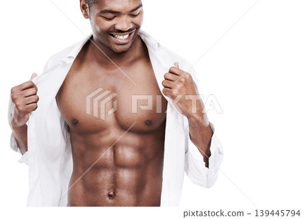 Man, fashion and muscle with abs, shirt and dressing for chest, african and male model in white background. Alone, smile and happy with six pack, body and corporate wear, stylish and masculine Man, fashion and muscle with abs, shirt and dressing for chest, african and male model in white background. Alone, smile and happy with six pack, body and corporate wear, stylish and masculine 139445794
