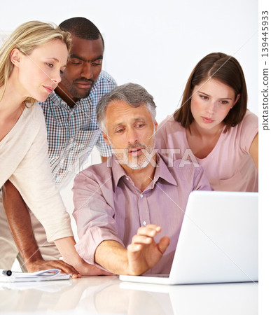 Business people, collaboration and teamwork on laptop for graphic design planning, manager feedback and advice. Group meeting, mature boss and creative designer team on computer and software training Business people, collaboration and teamwork on laptop for graphic design planning, manager feedback and advice. Group meeting, mature boss and creative designer team on computer and software training 139445933