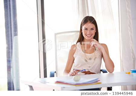 Fashion, designer and portrait at desk in office with happiness, creativity and small business owner planning. Working, table and woman in agency workplace of editor with confidence and smile 139445946
