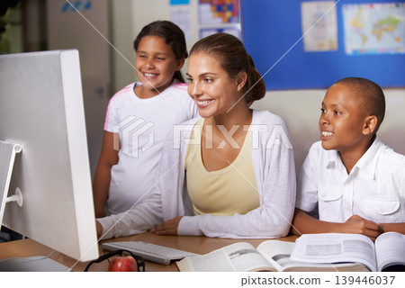 Happy teacher, computer and helping children or students in support for education, learning or classroom tutor at school. Woman or mentor teaching kids computer or technology skills for help in class Happy teacher, computer and helping children or students in support for education, learning or classroom tutor at school. Woman or mentor teaching kids computer or technology skills for help in class 139446037