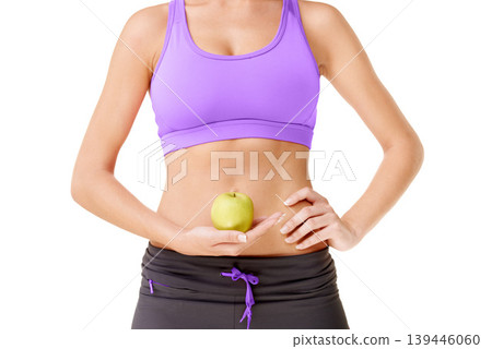 Woman, apple and stomach for health in studio with mock up for diet for digestion on white background. Female person, hold and fruit for nutrition, wellness and care with fresh, organic and produce. Woman, apple and stomach for health in studio with mock up for diet for digestion on white background. Female person, hold and fruit for nutrition, wellness and care with fresh, organic and produce. 139446060