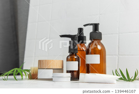 Skincare beauty products on marble with plant leaves 139446107