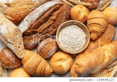 Freshly baked bread and pastries with baking flour 139446123