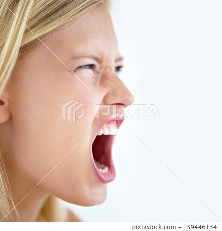 Angry, face or woman screaming in studio at mockup space for crisis, mad emoji or reaction on white background. Frustrated model, shouting or voice of anger, emotional conflict or negative expression Angry, face or woman screaming in studio at mockup space for crisis, mad emoji or reaction on white background. Frustrated model, shouting or voice of anger, emotional conflict or negative expression 139446134