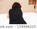 Woman, underwear, bed, reading a magazine, relaxing, image 139446225