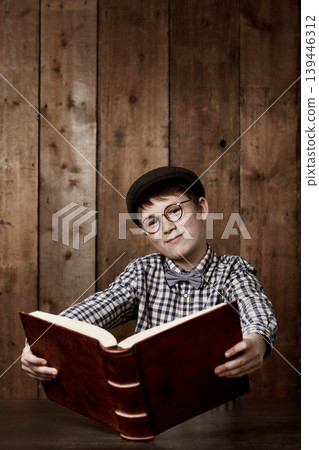 Education portrait, book and young child reading information, literature story or studying. Mockup knowledge space, textbook and happy kid student with academic learning, literacy or history homework Education portrait, book and young child reading information, literature story or studying. Mockup knowledge space, textbook and happy kid student with academic learning, literacy or history homework 139446312