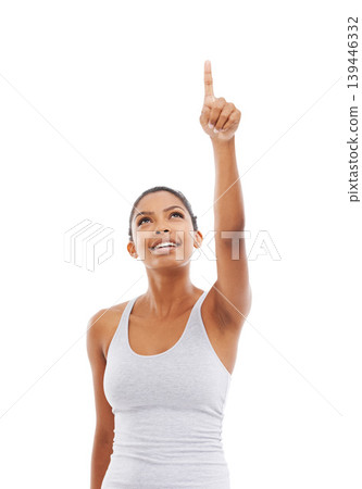 Pointing up, fitness and woman with opportunity, decision and wellness isolated on a white studio background. Person, hand gesture and model with exercise, promotion and choice with sports or workout 139446332