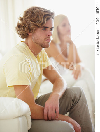 Angry couple, fight and divorce stress on a sofa with argument, anxiety or cheating depression in their home. Marriage crisis, dispute and overthinking man ignore frustrated woman in a living room Angry couple, fight and divorce stress on a sofa with argument, anxiety or cheating depression in their home. Marriage crisis, dispute and overthinking man ignore frustrated woman in a living room 139446504