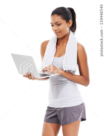 Fitness, internet and woman with a laptop, healthy and towel isolated on white studio background. Person, girl or model with a computer, technology and online with information, wellness or connection Fitness, internet and woman with a laptop, healthy and towel isolated on white studio background. Person, girl or model with a computer, technology and online with information, wellness or connection 139446540