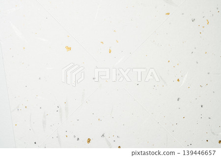 Washi paper material with scattered gold and silver decorations on a white background. 139446657