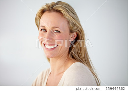 Portrait, smile and mature woman in studio with confident personality isolated on white background. Face of beautiful blond model in good mood, pride and happy to relax for optimism in New Zealand Portrait, smile and mature woman in studio with confident personality isolated on white background. Face of beautiful blond model in good mood, pride and happy to relax for optimism in New Zealand 139446862
