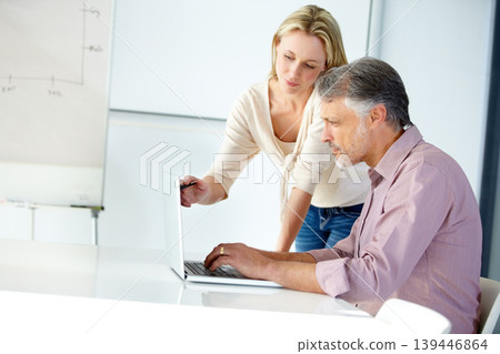 Business people, teamwork or pointing at laptop for advice, project management or results in creative agency. Collaboration, serious man and woman planning information, research or review on computer Business people, teamwork or pointing at laptop for advice, project management or results in creative agency. Collaboration, serious man and woman planning information, research or review on computer 139446864