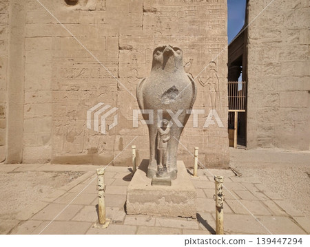 Horus falcon god ancient statue at edfu temple in egypt Horus falcon god ancient statue at edfu temple in egypt 139447294