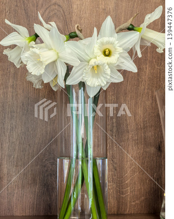 White Narcissus Beersheba Daffodils Bouquet in Glass Vase on Wood White Narcissus Beersheba Daffodils Bouquet in Glass Vase on Wood 139447376
