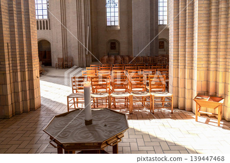 Grundtvig Church interior with minimalist architecture and soft natural light in Copenhagen Denmark. 139447468