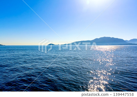 [Fukuoka] Early summer in Munakata: A view from the ferry heading from Kaminato Port to Oshima Island. 139447558