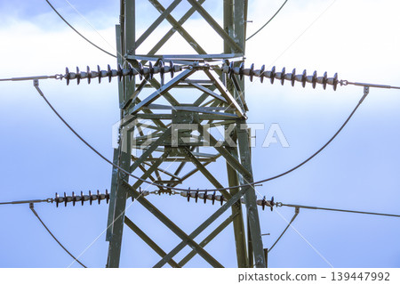 A close up view of the steelwork on an electrical transmission tower 139447992